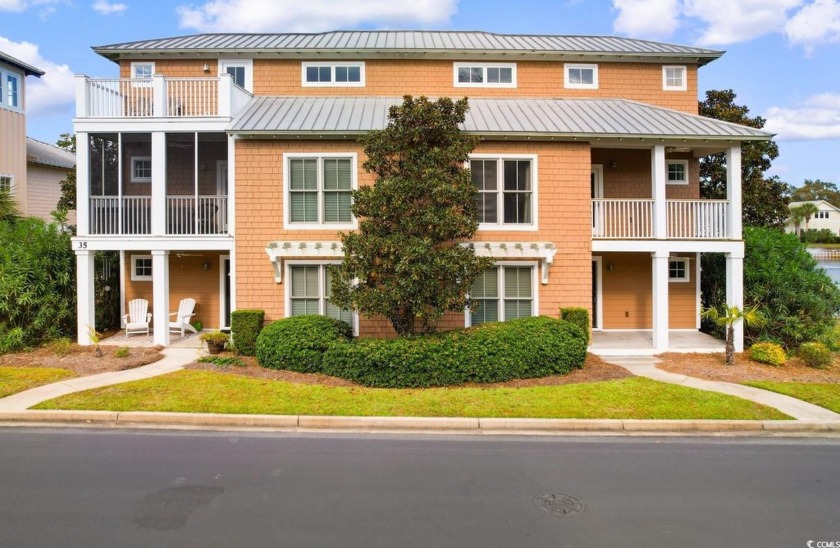 Welcome home to this luxurious 4 bedroom, 4 bathroom end unit - Beach Townhome/Townhouse for sale in Pawleys Island, South Carolina on Beachhouse.com