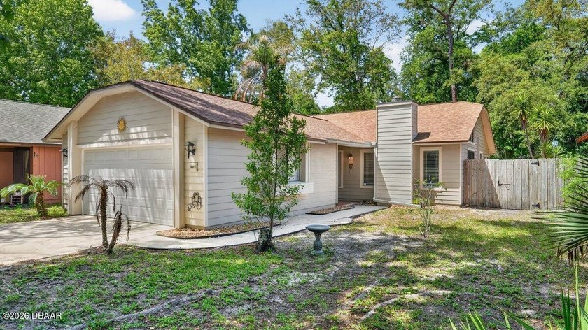 Tucked in a quiet cul-de-sac in desirable Tymber Creek, this - Beach Home for sale in Ormond Beach, Florida on Beachhouse.com