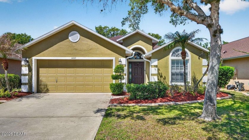 Tucked away in the desirable Waters Edge community, this - Beach Home for sale in Port Orange, Florida on Beachhouse.com