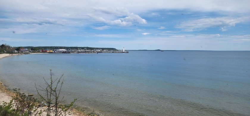 Waterfront in the heart of downtown St. Ignace! This rare vacant - Beach Lot for sale in Saint Ignace, Michigan on Beachhouse.com