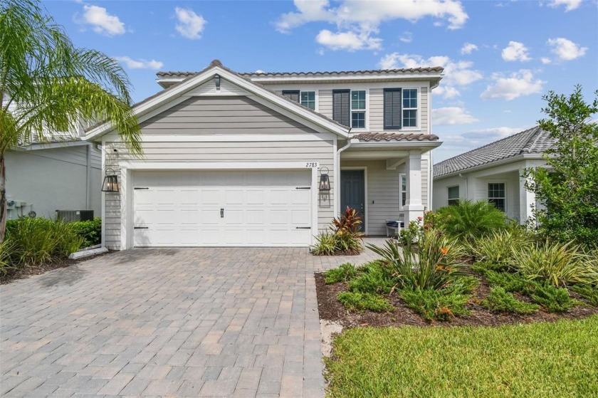 Welcome to Windward at Lakewood Ranch where this 2023-built home - Beach Home for sale in Sarasota, Florida on Beachhouse.com