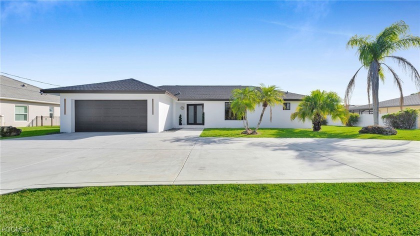 Welcome to luxurious living in this direct Gulf Access, pool - Beach Home for sale in Cape Coral, Florida on Beachhouse.com