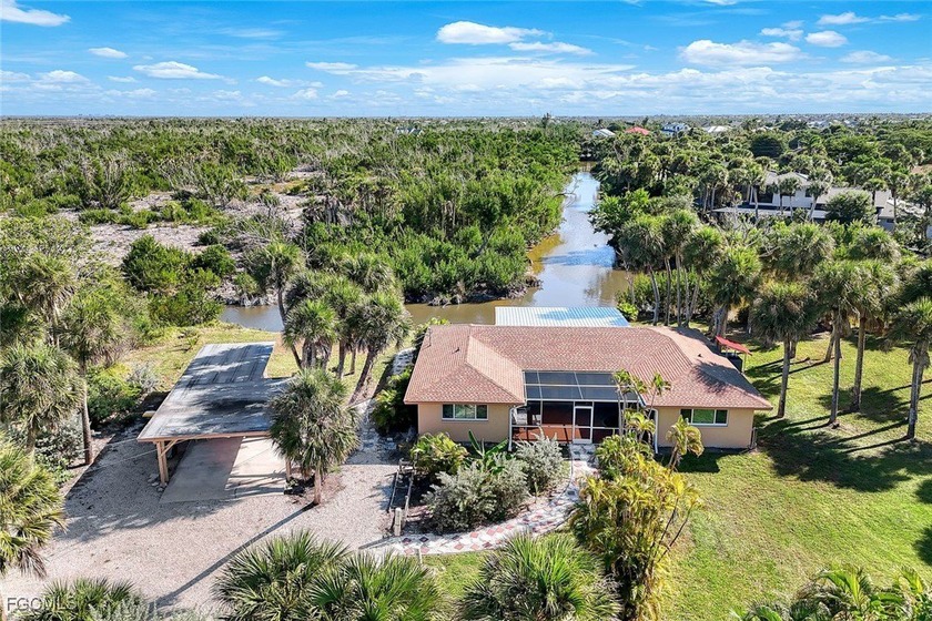 Tucked away on nearly a full acre in the highly desirable - Beach Home for sale in Sanibel, Florida on Beachhouse.com