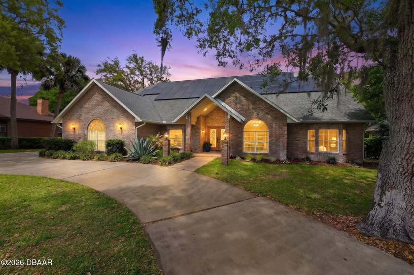 Stunning Custom Brick Home on Half-Acre Preserve Lot Nestled on - Beach Home for sale in Ormond Beach, Florida on Beachhouse.com