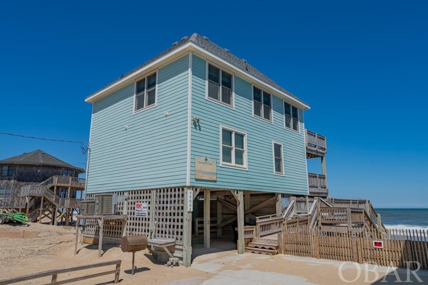 Experience the ultimate in oceanfront living with this exquisite - Beach Home for sale in Buxton, North Carolina on Beachhouse.com