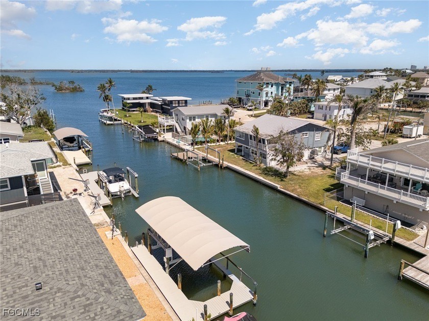 Located on a canal in Fort Myers Beach, this elevated - Beach Home for sale in Fort Myers Beach, Florida on Beachhouse.com