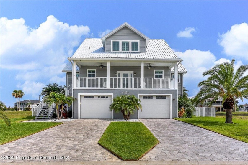 COASTAL BREEZES & SUNSETS!  WHY BUILD?  This 2018 Waterfront - Beach Home for sale in Hernando Beach, Florida on Beachhouse.com