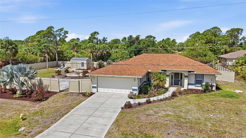 Stunning pool home set on a rare DOULBE lot in Port Charlotte - Beach Home for sale in Port Charlotte, Florida on Beachhouse.com