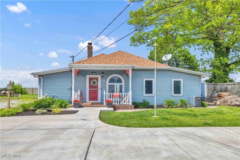 Nestled along the serene shores of Lake Erie, this charming 2 - Beach Home for sale in Lorain, Ohio on Beachhouse.com