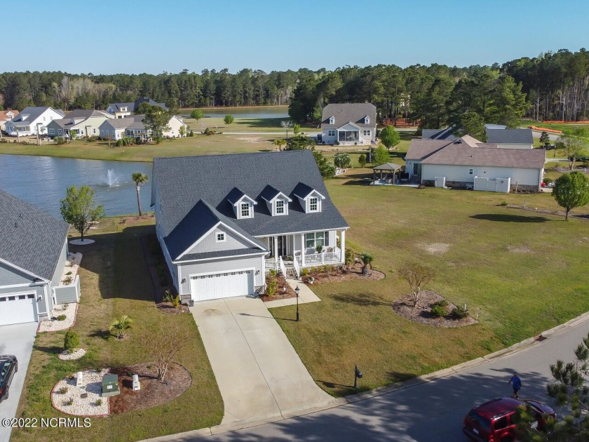 This stunning, masterfully designed 4BR/3.5BA waterfront home - Beach Home for sale in Calabash, North Carolina on Beachhouse.com