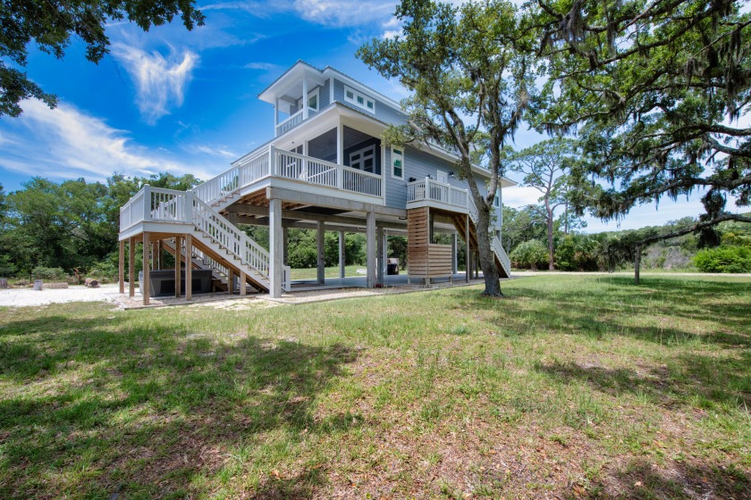 This amazing property is a rare find.  Nestled between a state - Beach Home for sale in St. George Island, Florida on Beachhouse.com