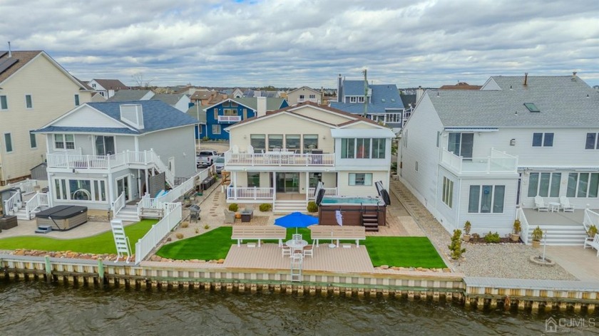 Discover the pinnacle of bayfront luxury living with this - Beach Home for sale in Brick, New Jersey on Beachhouse.com