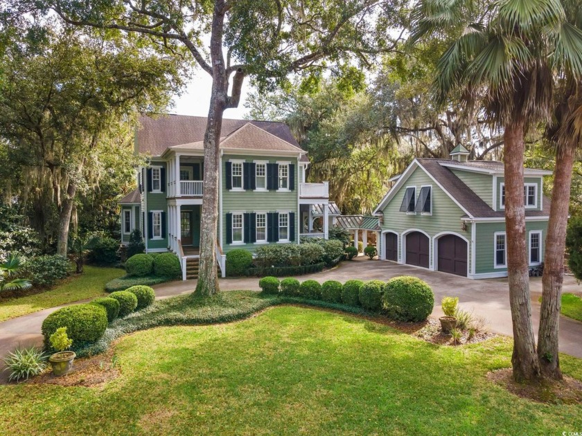 The pond view is breathtaking! This Low Country 5 bedroom, 5 - Beach Home for sale in Georgetown, South Carolina on Beachhouse.com