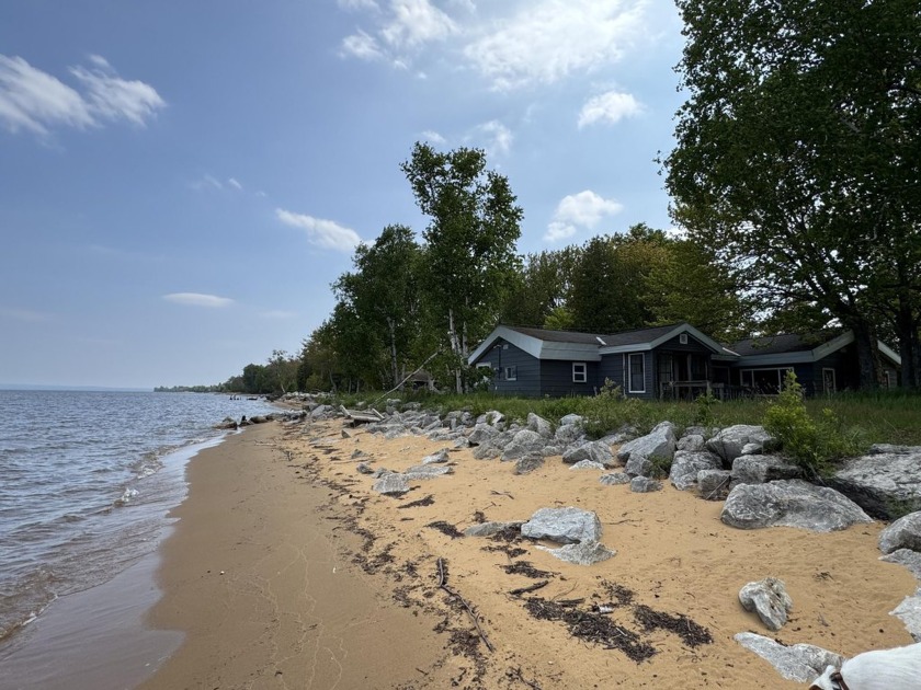 A renovation project with a stunning view. Sitting on an acre of - Beach Home for sale in Paradise, Michigan on Beachhouse.com