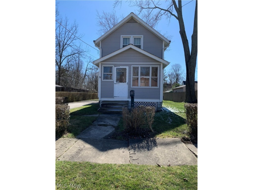 Come have a look at this one and a half story home two bedrooms - Beach Home for sale in Painesville, Ohio on Beachhouse.com