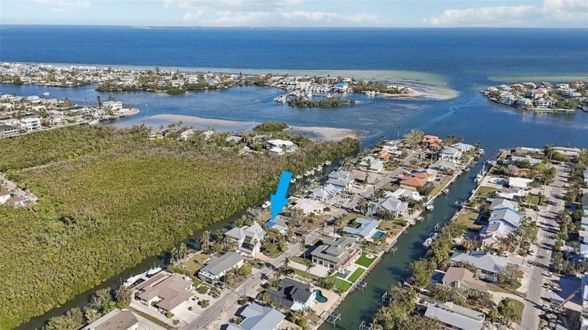 Discover this charming 1,579-square-foot home nestled on a - Beach Home for sale in Holmes Beach, Florida on Beachhouse.com