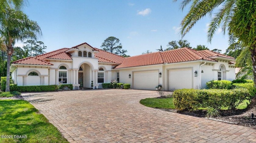 LIVING IN LUXURY in the exclusive Wild Oaks neighborhood of - Beach Home for sale in Palm Coast, Florida on Beachhouse.com
