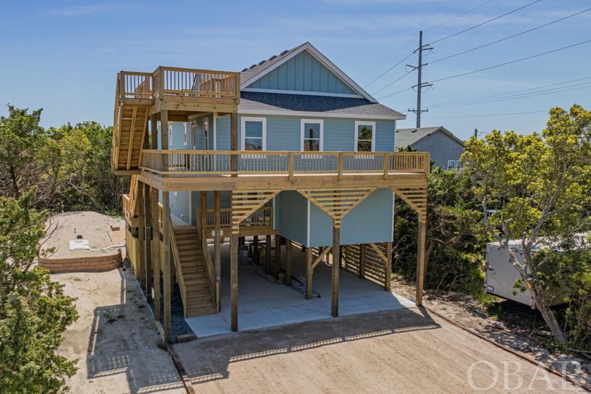 Discover this recently completed new construction home in Avon - Beach Home for sale in Avon, North Carolina on Beachhouse.com