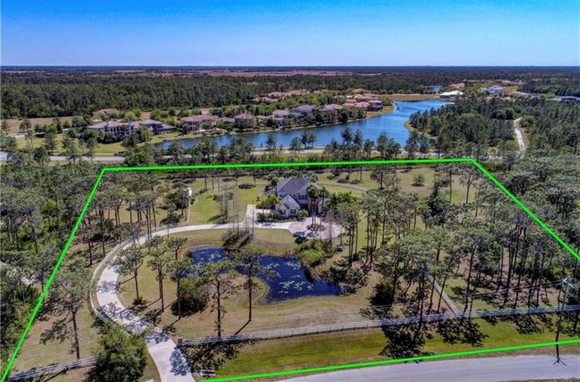 This gorgeous estate home in Panther Ridge - Foxwood is on 5 - Beach Home for sale in Bradenton, Florida on Beachhouse.com