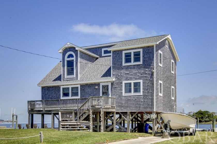 Located on Kings Point in Brigands Bay, this property showcases - Beach Home for sale in Frisco, North Carolina on Beachhouse.com