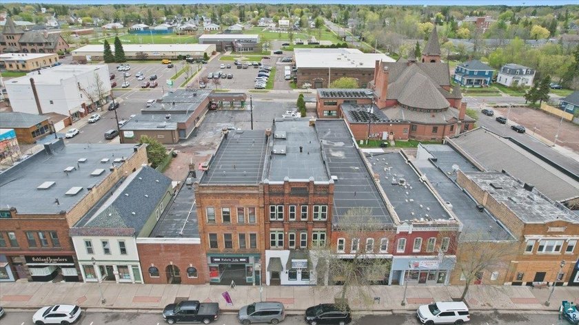 Located in the heart of downtown Ashland, this 6-unit mixed-use - Beach Home for sale in Ashland, Wisconsin on Beachhouse.com