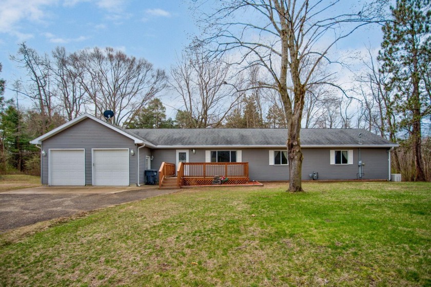 Tucked away on almost 5 wooded acres, this exceptional, private - Beach Home for sale in Covert, Michigan on Beachhouse.com