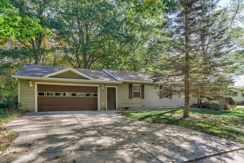 Location shines here. This well-maintained home offers cathedral - Beach Home for sale in South Haven, Michigan on Beachhouse.com