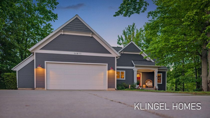 Welcome to this beautifully updated traditional-style home - Beach Home for sale in Spring Lake, Michigan on Beachhouse.com