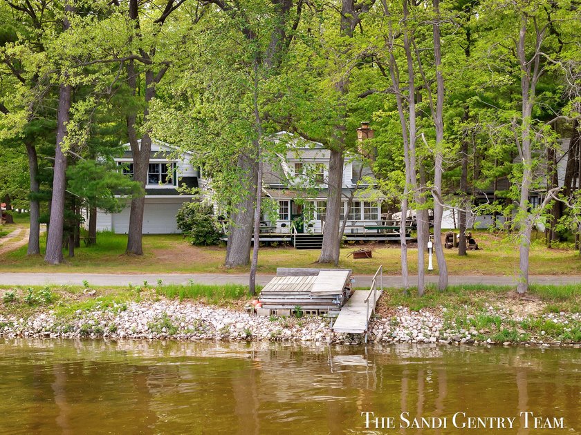 Welcome to your own slice of Pentwater paradise on Bass Lake - Beach Home for sale in Pentwater, Michigan on Beachhouse.com