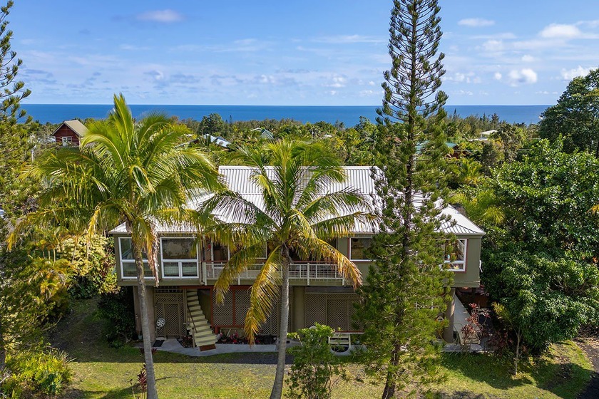This striking architect-designed residence is ideally situated - Beach Home for sale in Pahoa, Hawaii on Beachhouse.com