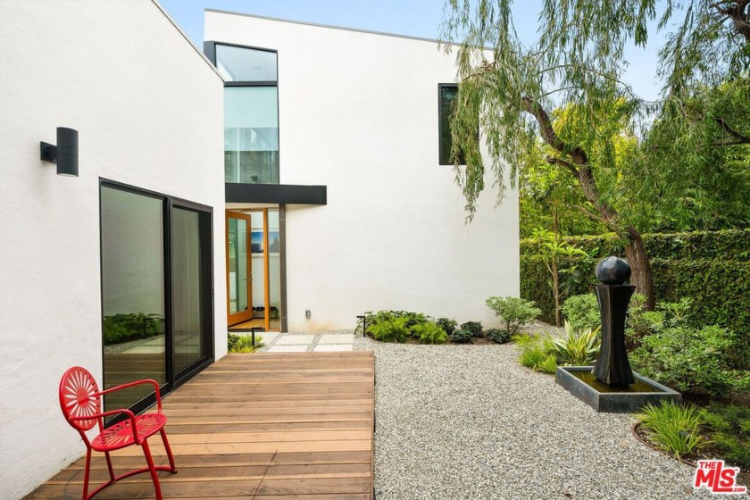 This updated Ocean Park home offers a 3 bedroom, 2 bathroom main - Beach Home for sale in Santa Monica, California on Beachhouse.com