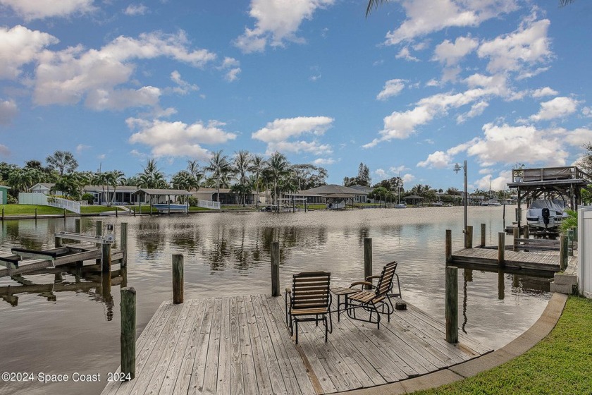 CANAL FRONT HOME IN THE HEART OF SATELLITE BEACH! This cozy - Beach Home for sale in Satellite Beach, Florida on Beachhouse.com