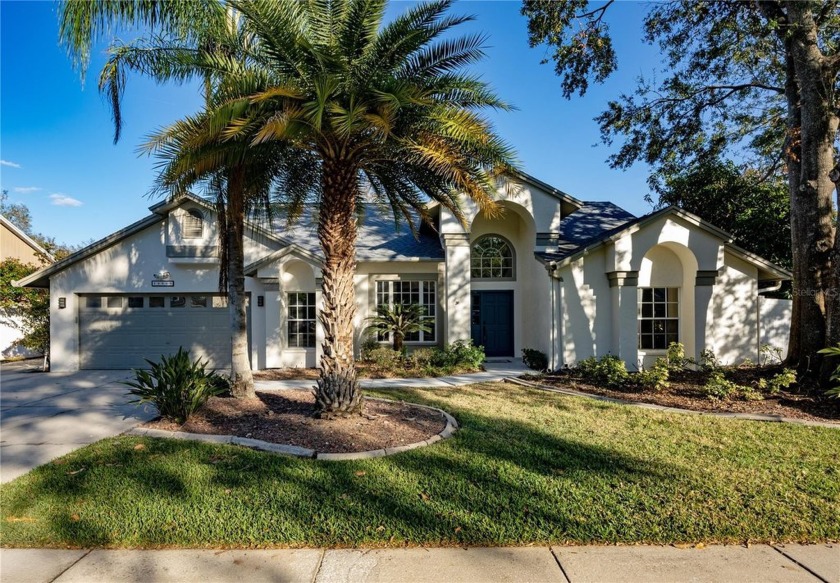 RARE **WATERFRONT** LUXURY EXECUTIVE home in CARROLLWOOD VILLAGE - Beach Home for sale in Tampa, Florida on Beachhouse.com