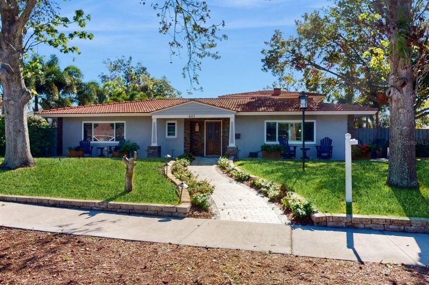 Nestled in the charming Town of Belleair, this beautifully - Beach Home for sale in Belleair Beach, Florida on Beachhouse.com