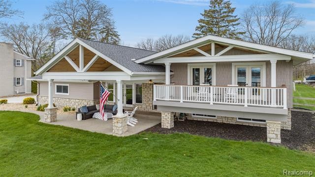 Nestled along the tranquil waterfront, this exquisite 4-bedroom - Beach Home for sale in Grosse Ile, Michigan on Beachhouse.com