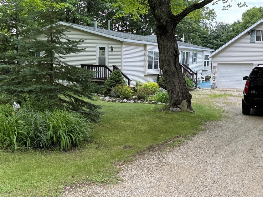 This is an impeccable 2001-02 manufactured 3 bedroom home  (one - Beach Home for sale in Grand Marais, Michigan on Beachhouse.com