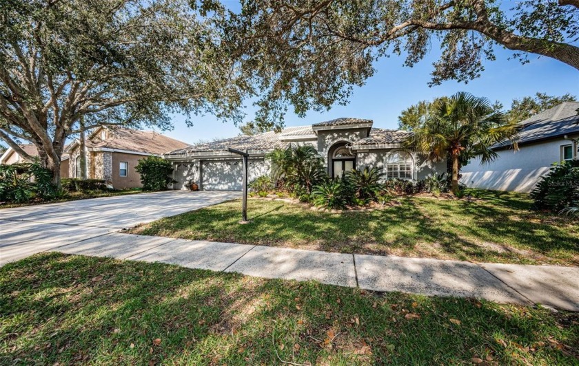 This STUNNING 3,300+ sq. ft 5 Bed/ 3 Bath/ 3 Car Garage home - Beach Home for sale in Palm Harbor, Florida on Beachhouse.com