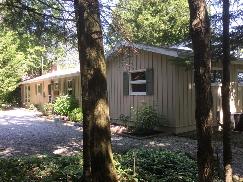 Beautifully maintained WOODLAND PARK  5 bedroom home with a - Beach Home for sale in Cedarville, Michigan on Beachhouse.com