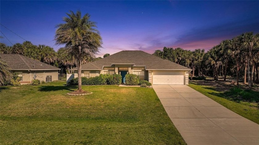 What a MOVE IN READY beauty! This double-lot, spacious 4-bedroom - Beach Home for sale in North Port, Florida on Beachhouse.com