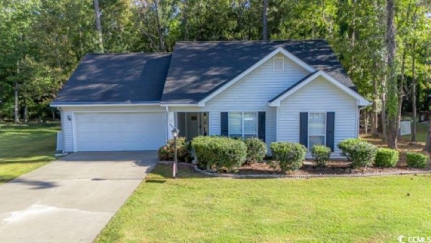 Nestled in the highly sought after Colonial Charters Golf Course - Beach Home for sale in Longs, South Carolina on Beachhouse.com