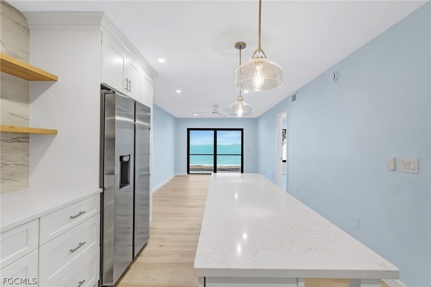 Wake up to breathtaking sunrises over the bay from this - Beach Condo for sale in Sanibel, Florida on Beachhouse.com