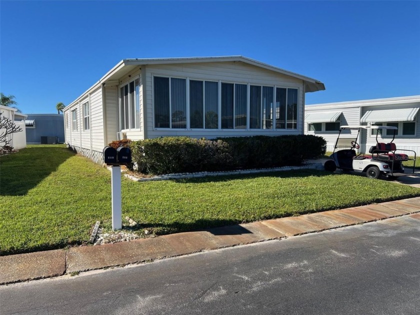 BRAND NEW CARPORT COMING! Four Seasons Estates is a charming 55+ - Beach Home for sale in Largo, Florida on Beachhouse.com