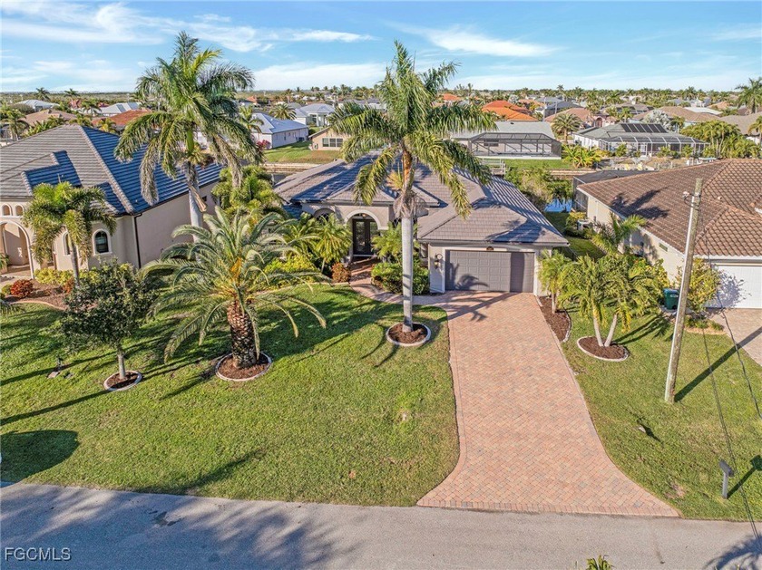 This beautifully maintained Cape Coral residence offers the - Beach Home for sale in Cape Coral, Florida on Beachhouse.com