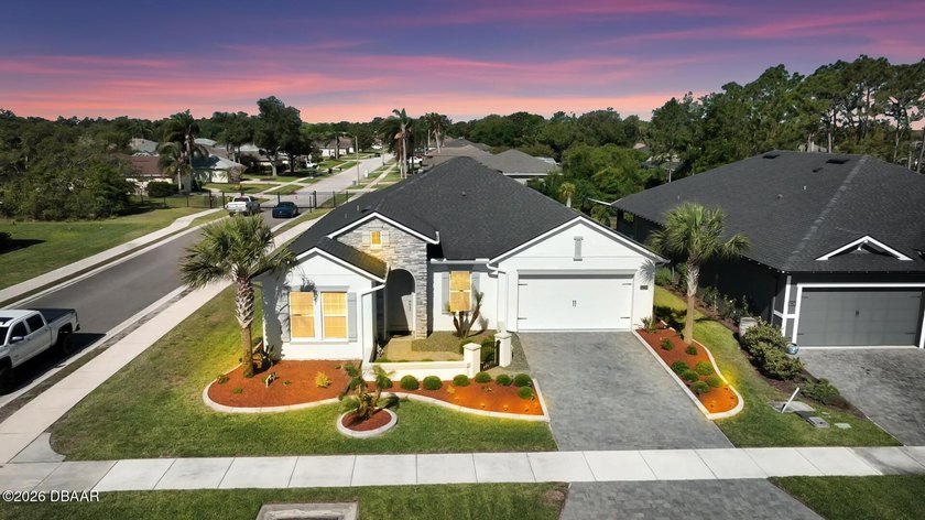 Welcome to this stunning Tuscan-style home in a sought-after - Beach Home for sale in Port Orange, Florida on Beachhouse.com