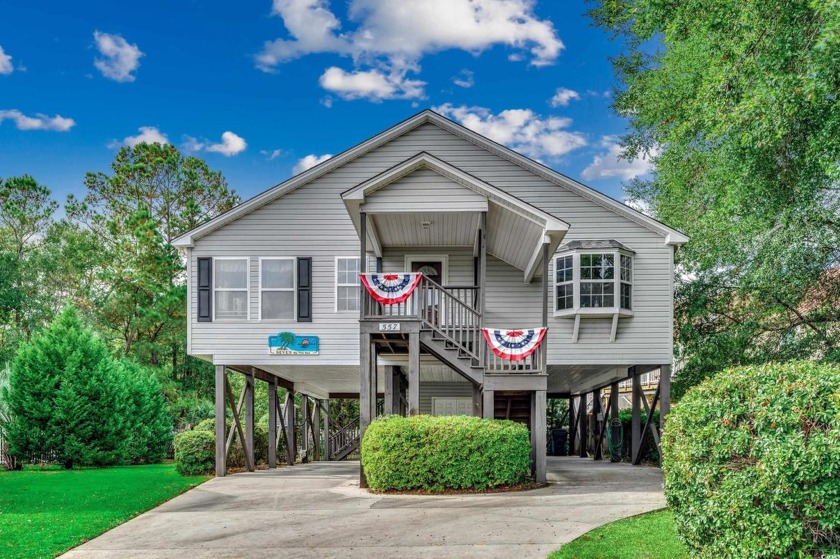 Welcome to 557 Bay Drive Extension, a single-level raised beach - Beach Home for sale in Garden City Beach, South Carolina on Beachhouse.com