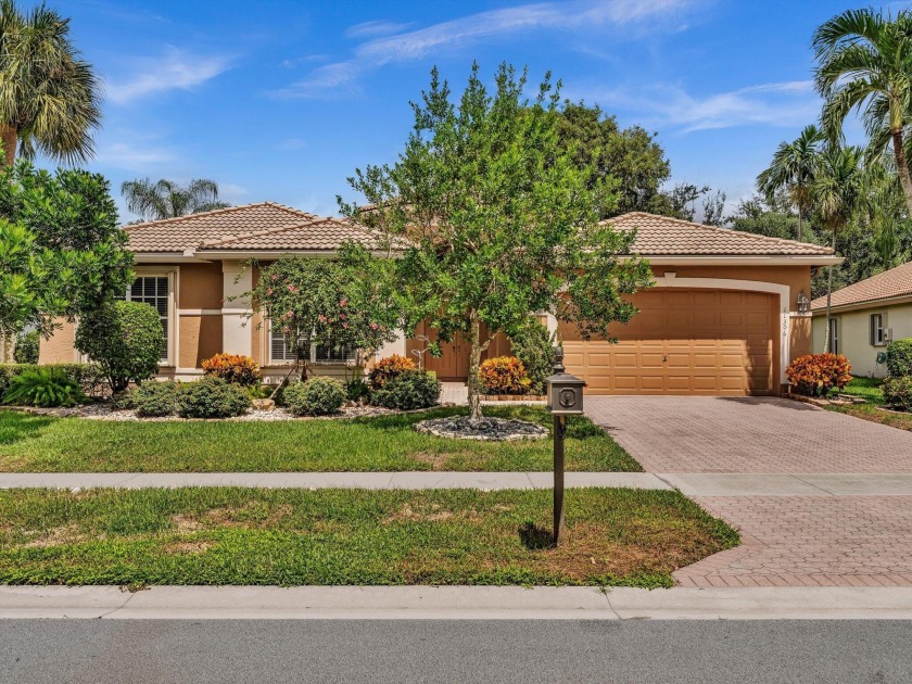 Situated on one of Valencia Lakes private, perimeter lots with - Beach Home for sale in Boynton Beach, Florida on Beachhouse.com