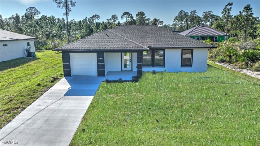 Welcome to this well-designed and spacious new construction home - Beach Home for sale in Lehigh Acres, Florida on Beachhouse.com