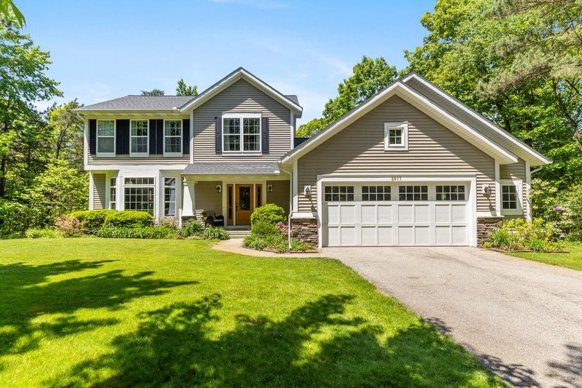 Enjoy the private setting to this beautiful home featuring 5 - Beach Home for sale in Holland, Michigan on Beachhouse.com