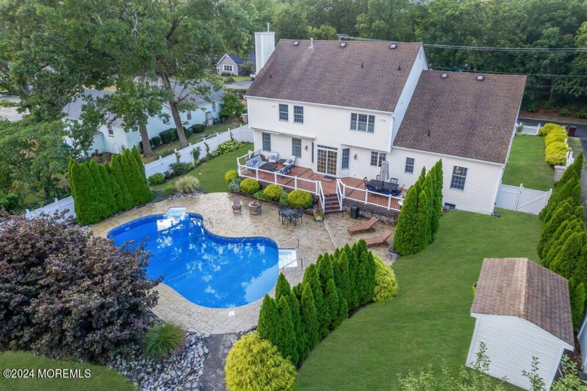 Welcome to this exquisite 5-bedroom, 3-bathroom Colonial - Beach Home for sale in Pine Beach, New Jersey on Beachhouse.com