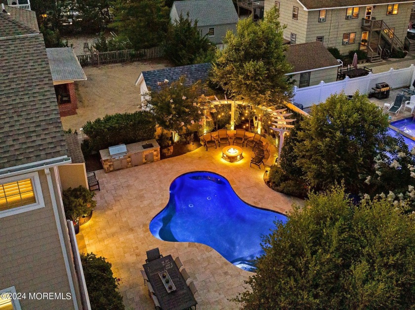 ENJOY CASUAL POOLSIDE OPULENCE...in this enchanting Island - Beach Home for sale in Surf City, New Jersey on Beachhouse.com